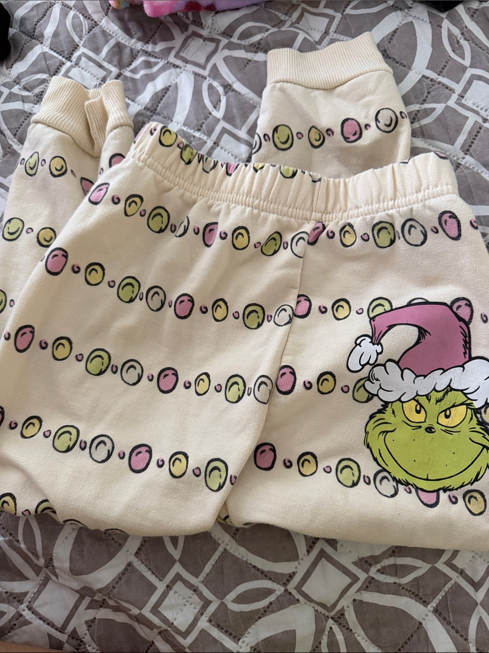 Grinch Cream Kids Pajama Bottoms with Pink & Green Accents